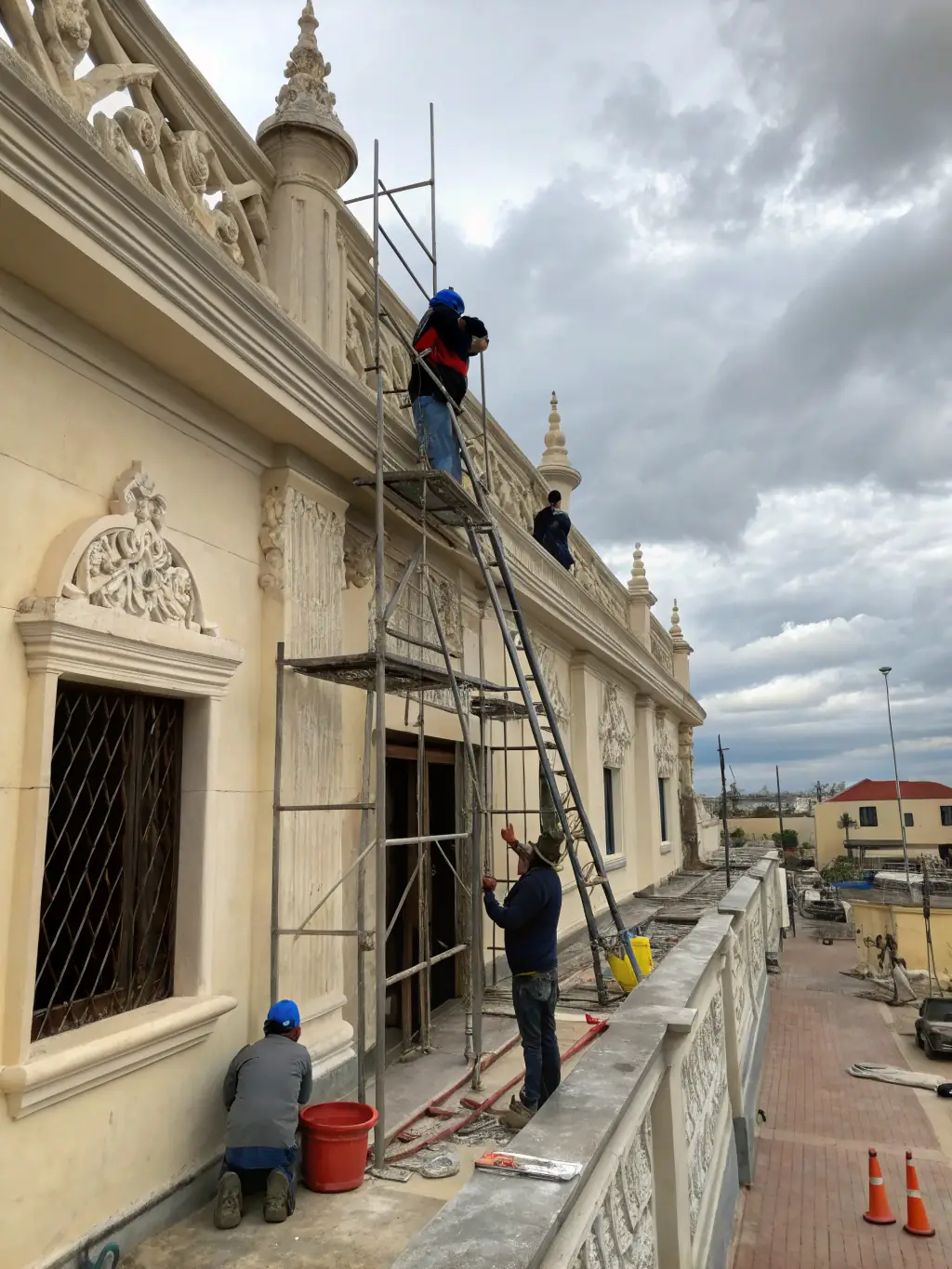 A detailed photograph showcasing the step-by-step process of restoring a heritage building's facade, emphasizing the tools and techniques used by preservationists.